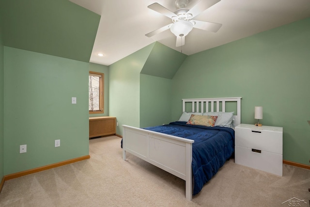 bedroom with vaulted ceiling, baseboards, a ceiling fan, and carpet flooring