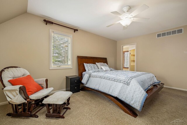bedroom with baseboards, carpet, lofted ceiling, and visible vents