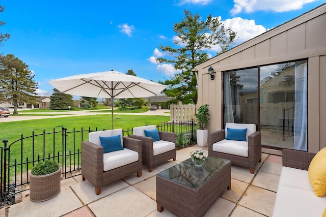 view of patio / terrace with fence and an outdoor hangout area