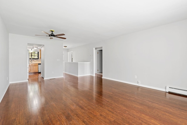 unfurnished living room featuring a ceiling fan, baseboards, a baseboard heating unit, and dark wood-type flooring