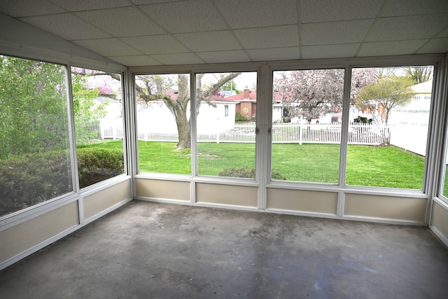 unfurnished sunroom featuring a wealth of natural light