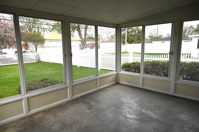 unfurnished sunroom featuring a wealth of natural light