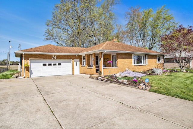 ranch-style house featuring driveway, a chimney, a front yard, brick siding, and an attached garage