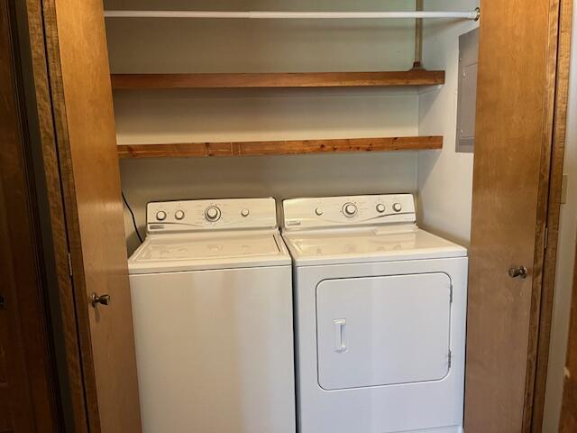 laundry room featuring laundry area and washing machine and dryer