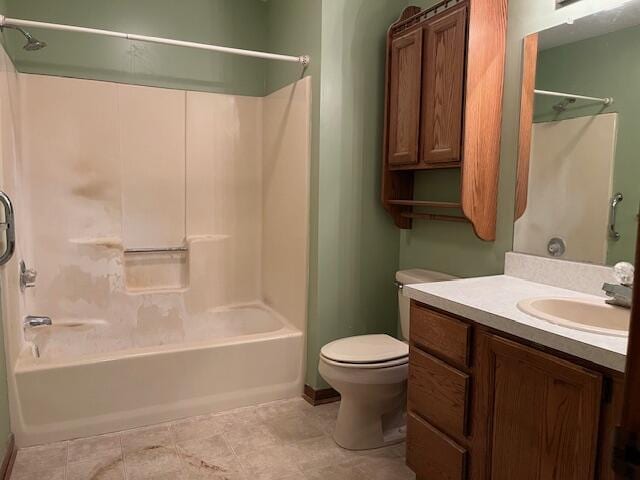 bathroom featuring vanity, toilet, and bathtub / shower combination