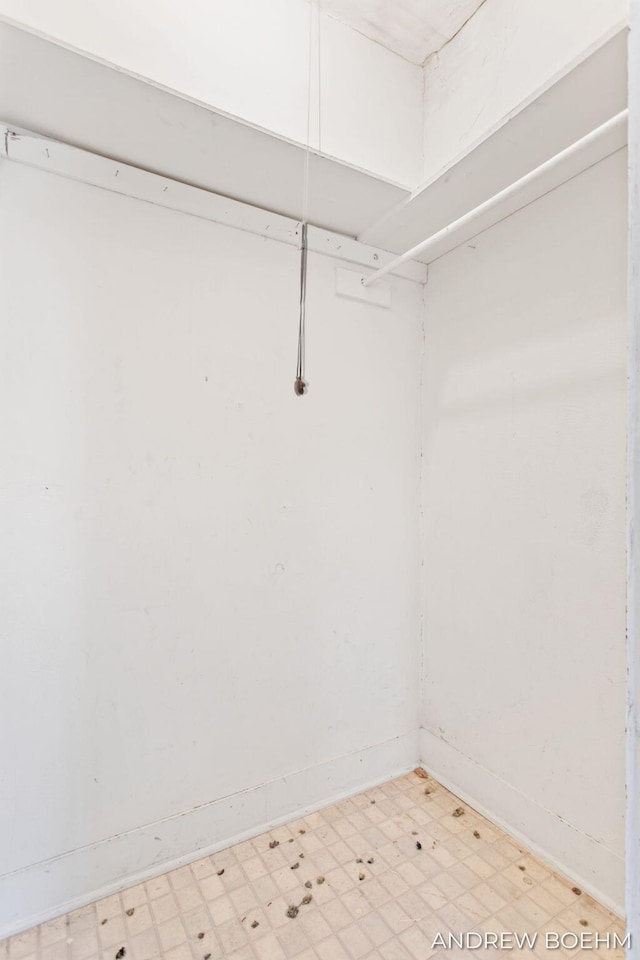 spacious closet with light floors