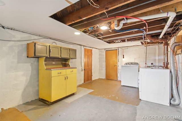 unfinished below grade area with washer and dryer