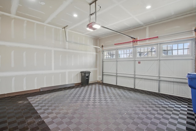 garage featuring a garage door opener