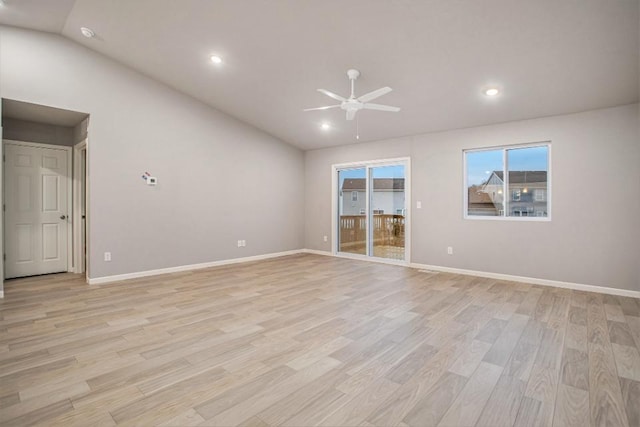spare room with lofted ceiling, baseboards, ceiling fan, light wood-type flooring, and recessed lighting