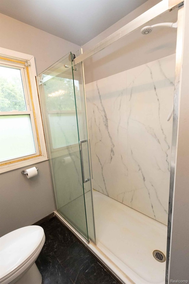 968 N Wilder Rd, Lapeer, MI 48446 - bathroom featuring toilet, a marble finish shower, and marble look tile flooring