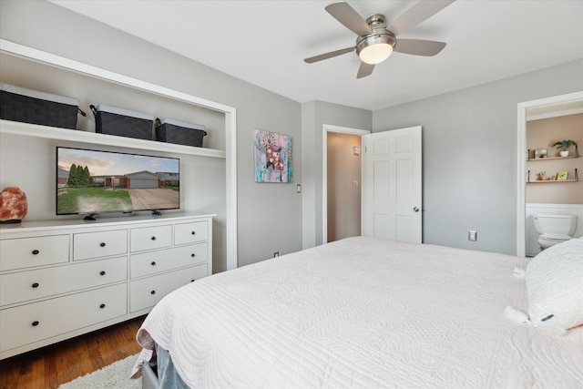 bedroom with ceiling fan and dark wood-style flooring