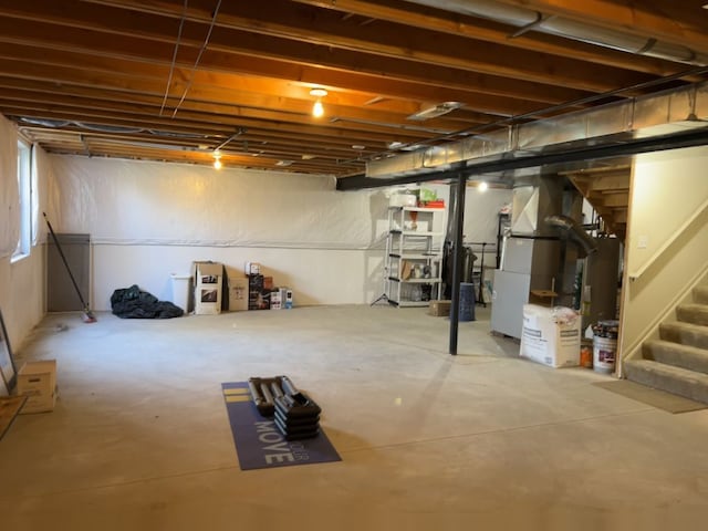 1082 Paddock Dr Unit 78, South Lyon, MI 48178 - unfinished below grade area with heating unit and stairs