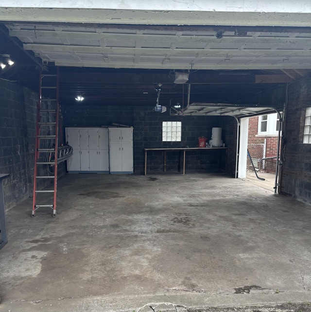 garage featuring a garage door opener