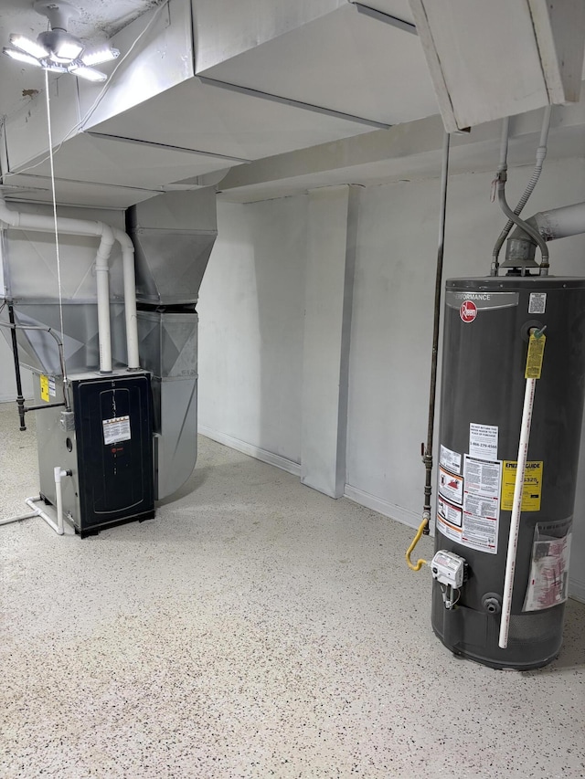 finished below grade area featuring gas water heater