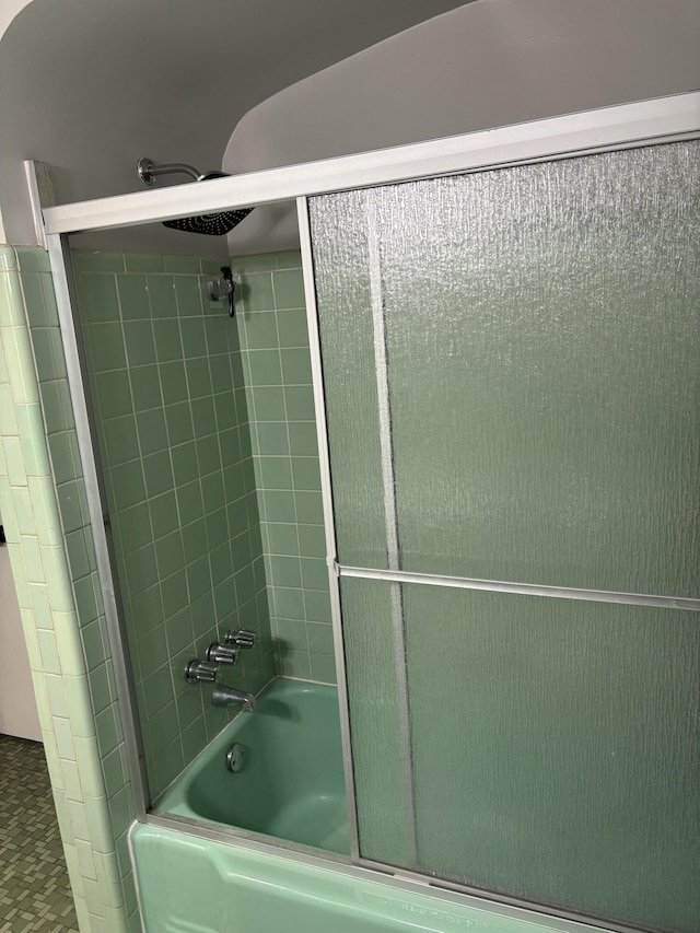 full bathroom with shower / bath combination with glass door