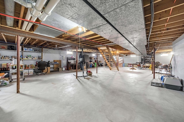 unfinished basement with stairway