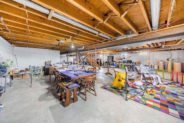 unfinished below grade area featuring a workshop area