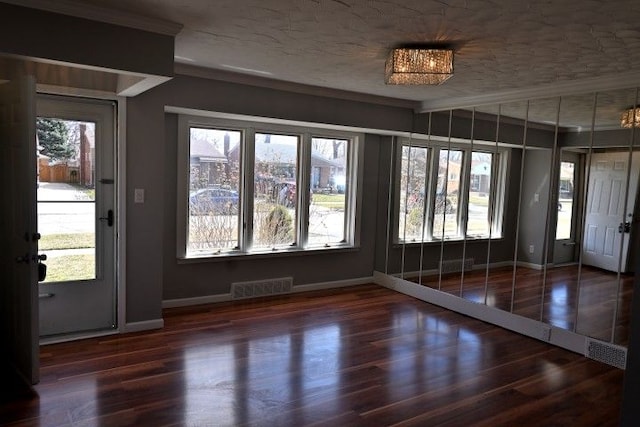 17518 Koester St, Riverview, MI 48193 - entryway featuring ornamental molding, baseboards, and wood finished floors