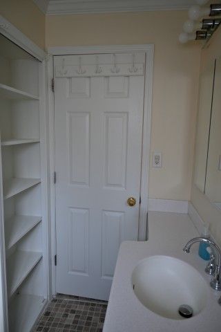 17518 Koester St, Riverview, MI 48193 - bathroom with ornamental molding and a sink