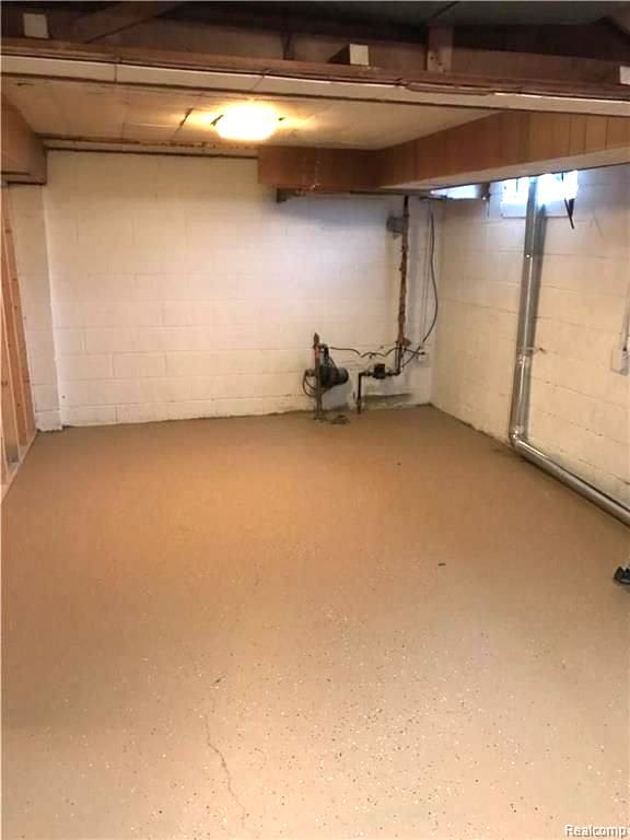 8404 Westminster Ave, Warren, MI 48089 - unfinished basement with concrete block wall