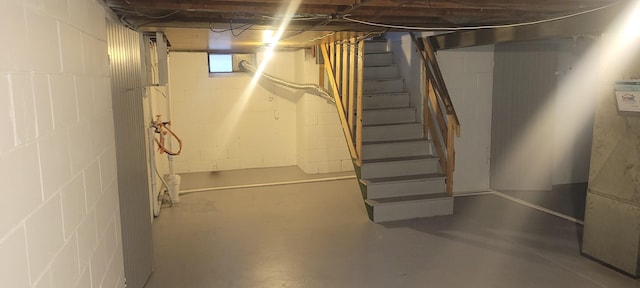 basement featuring stairway