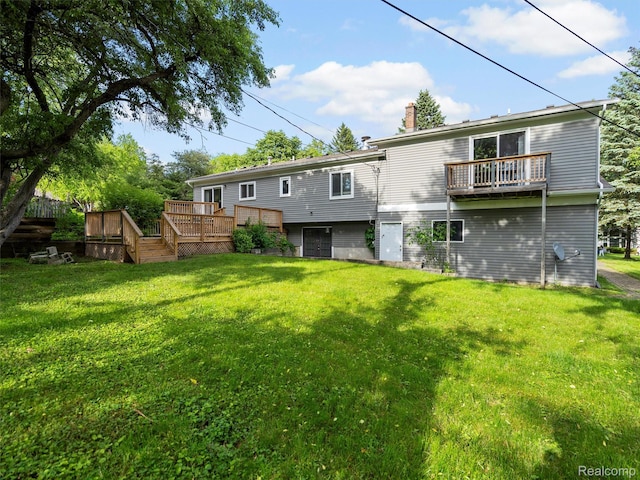 5620 Eastman Blvd, West Bloomfield, MI 48323 - rear view of house with a yard, a wooden deck, and a chimney