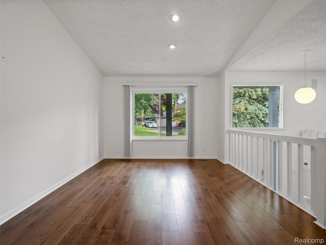 5620 Eastman Blvd, West Bloomfield, MI 48323 - empty room featuring a textured ceiling, wood finished floors, recessed lighting, and baseboards