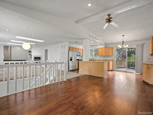 5620 Eastman Blvd, West Bloomfield, MI 48323 - kitchen featuring stainless steel appliances, a textured ceiling, a center island, wood finished floors, and light brown cabinets