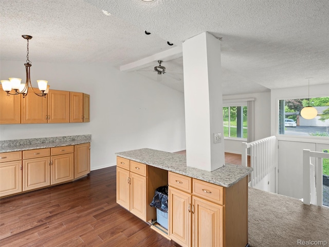 5620 Eastman Blvd, West Bloomfield, MI 48323 - kitchen featuring a textured ceiling, dark wood-style floors, a chandelier, hanging light fixtures, and light stone counters