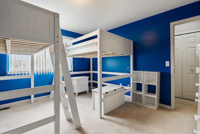 bedroom featuring carpet floors, baseboards, and visible vents