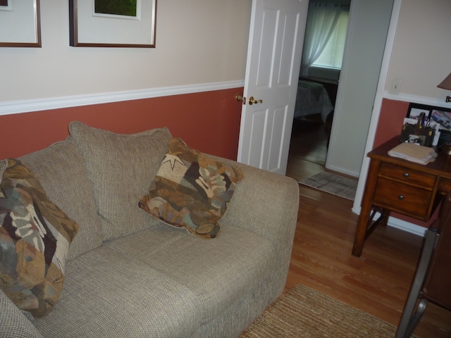 bedroom featuring wood finished floors