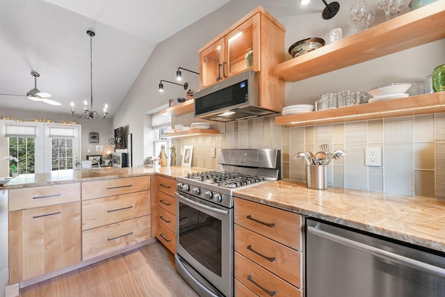 kitchen featuring open shelves, appliances with stainless steel finishes, lofted ceiling, and light brown cabinets