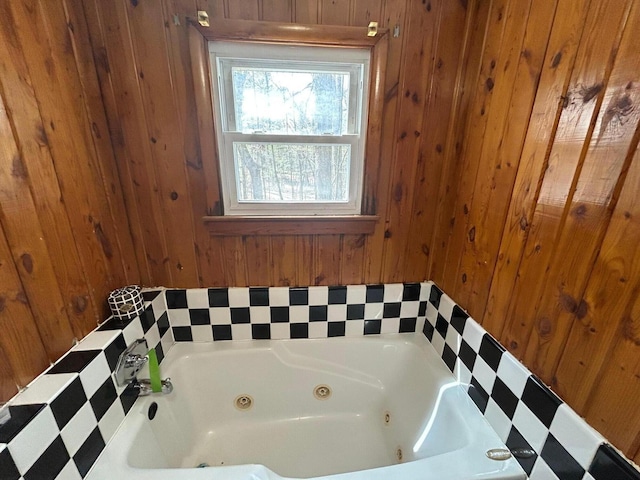 757 E Sidney Rd, Stanton, MI 48888 - bathroom with a whirlpool tub and wood walls