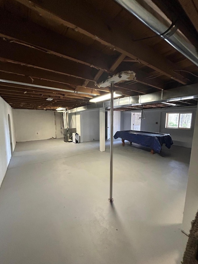 757 E Sidney Rd, Stanton, MI 48888 - below grade area with heating unit and billiards