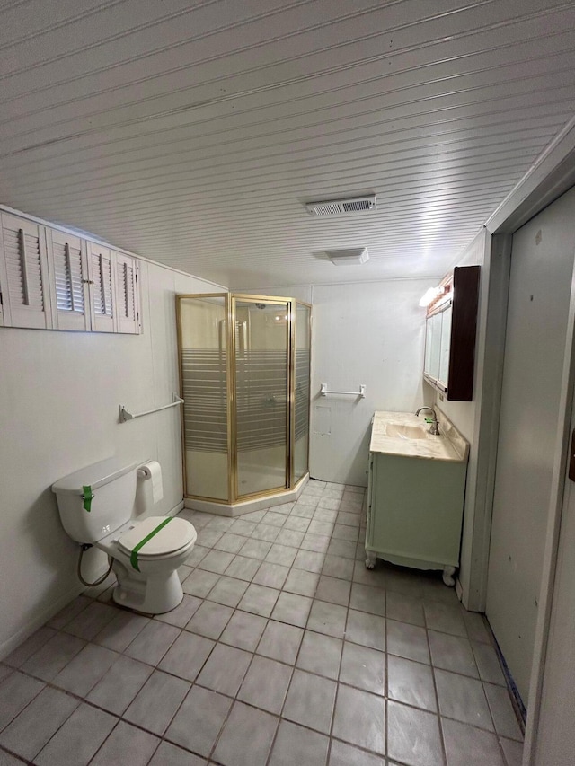 757 E Sidney Rd, Stanton, MI 48888 - bathroom with vanity, tile patterned flooring, a shower stall, and toilet