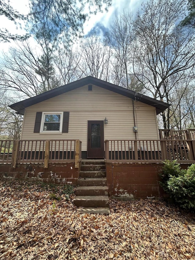 757 E Sidney Rd, Stanton, MI 48888 - view of front of home with a deck