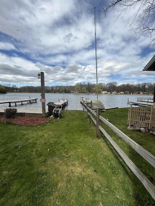 757 E Sidney Rd, Stanton, MI 48888 - dock area featuring a water view and a yard