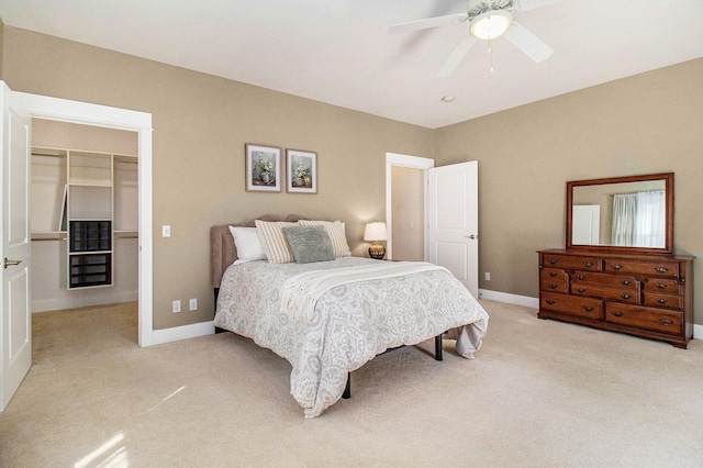 8 Georgia Ct, Pentwater, MI 49449 - bedroom with a closet, baseboards, light colored carpet, and a spacious closet