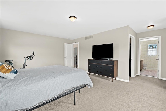 bedroom featuring carpet floors, baseboards, connected bathroom, and visible vents