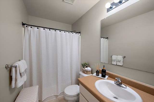 full bath featuring toilet, visible vents, and vanity
