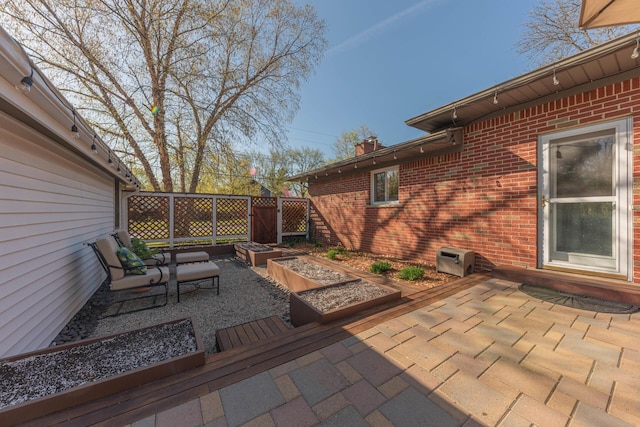view of patio / terrace featuring a garden