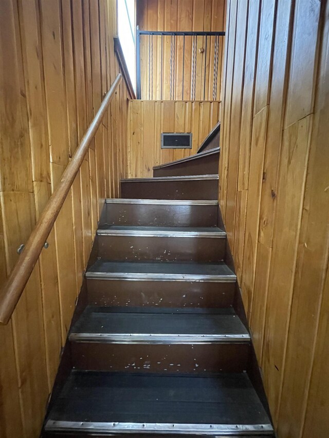 2314 Begole St, Flint, MI 48504 - stairs featuring wooden walls