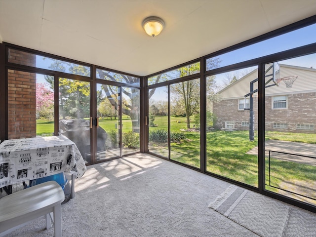 sunroom featuring a healthy amount of sunlight