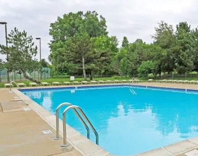 community pool with fence