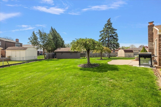 view of yard featuring a fenced backyard and a patio area