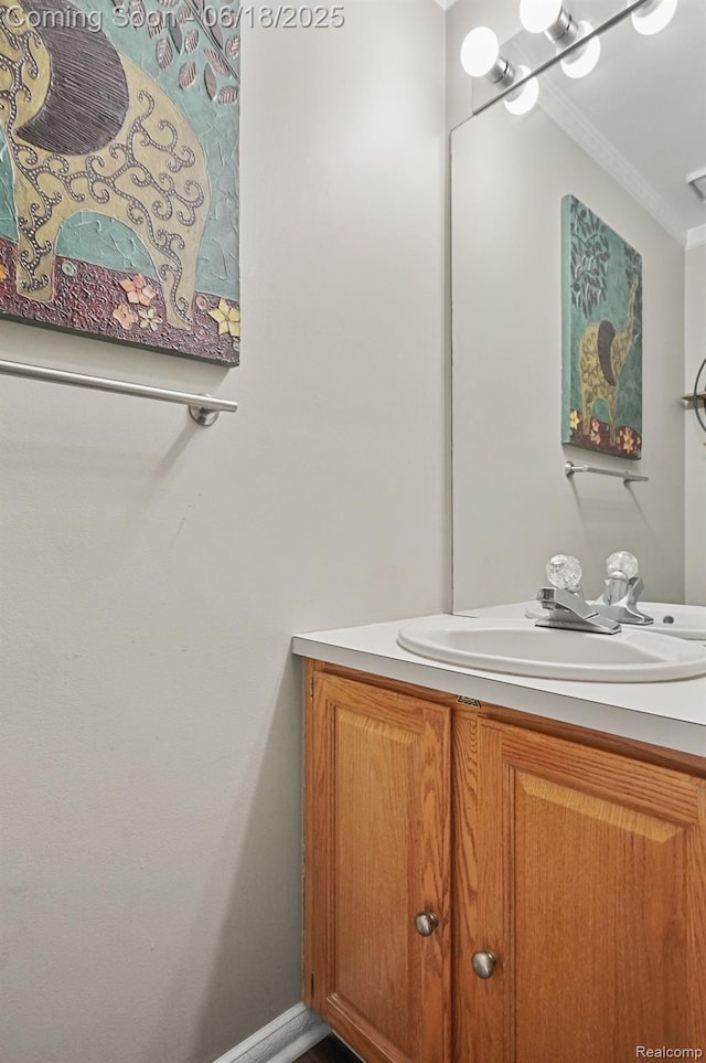 1710 Dawncrest Dr, West Bloomfield, MI 48324 - bathroom with vanity and ornamental molding
