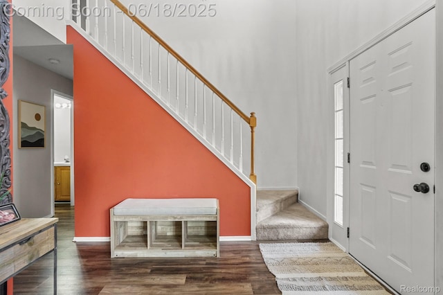 1710 Dawncrest Dr, West Bloomfield, MI 48324 - foyer featuring stairs, wood finished floors, and a towering ceiling