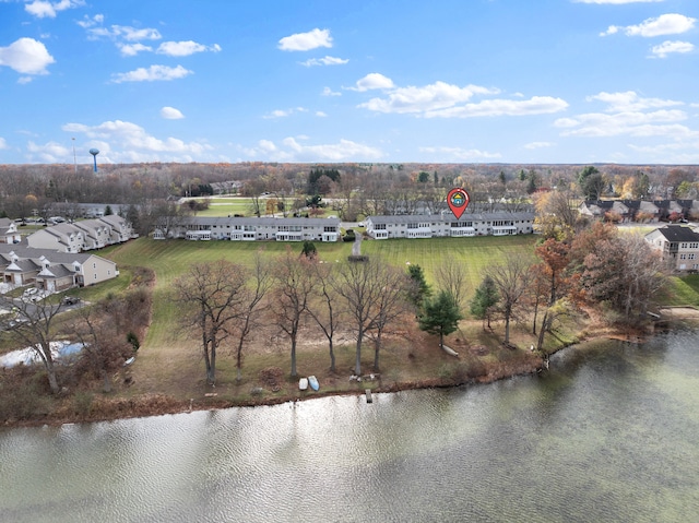 birds eye view of property featuring a water view and a residential view
