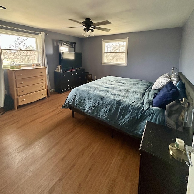 613 E Rolston, Linden, MI 48415 - bedroom featuring ceiling fan and wood finished floors