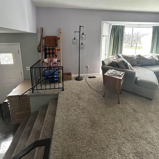 613 E Rolston, Linden, MI 48415 - carpeted living area featuring a healthy amount of sunlight